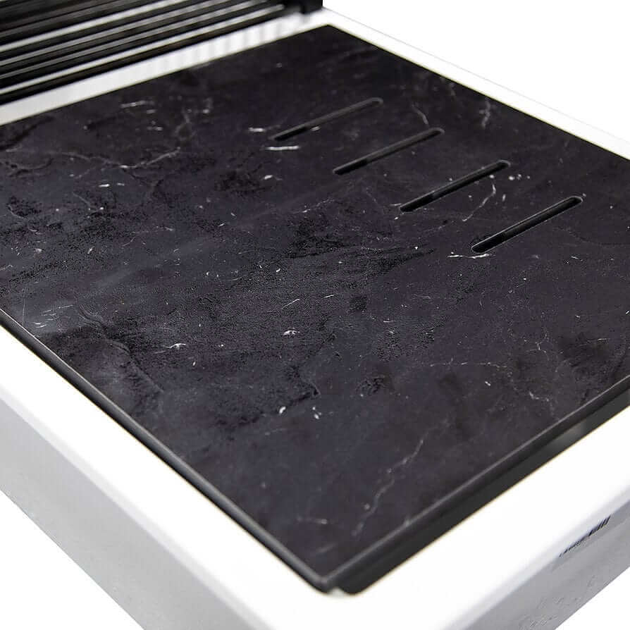 Nantucket 34" White Granite Composite Nano Workstation Undermount Kitchen Sink - PR3419-W-UM with a sleek black cutting board.