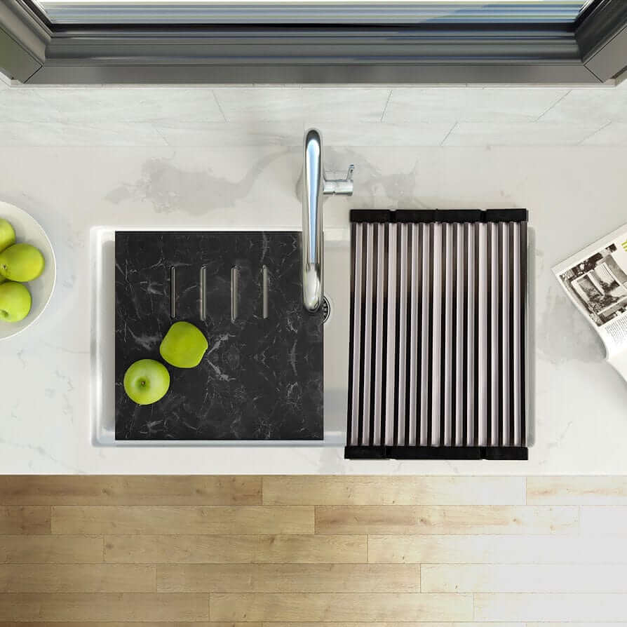 Nantucket 34" White Granite Composite Nano Workstation Undermount Kitchen Sink - PR3419-W-UM with accessories and apples on countertop.
