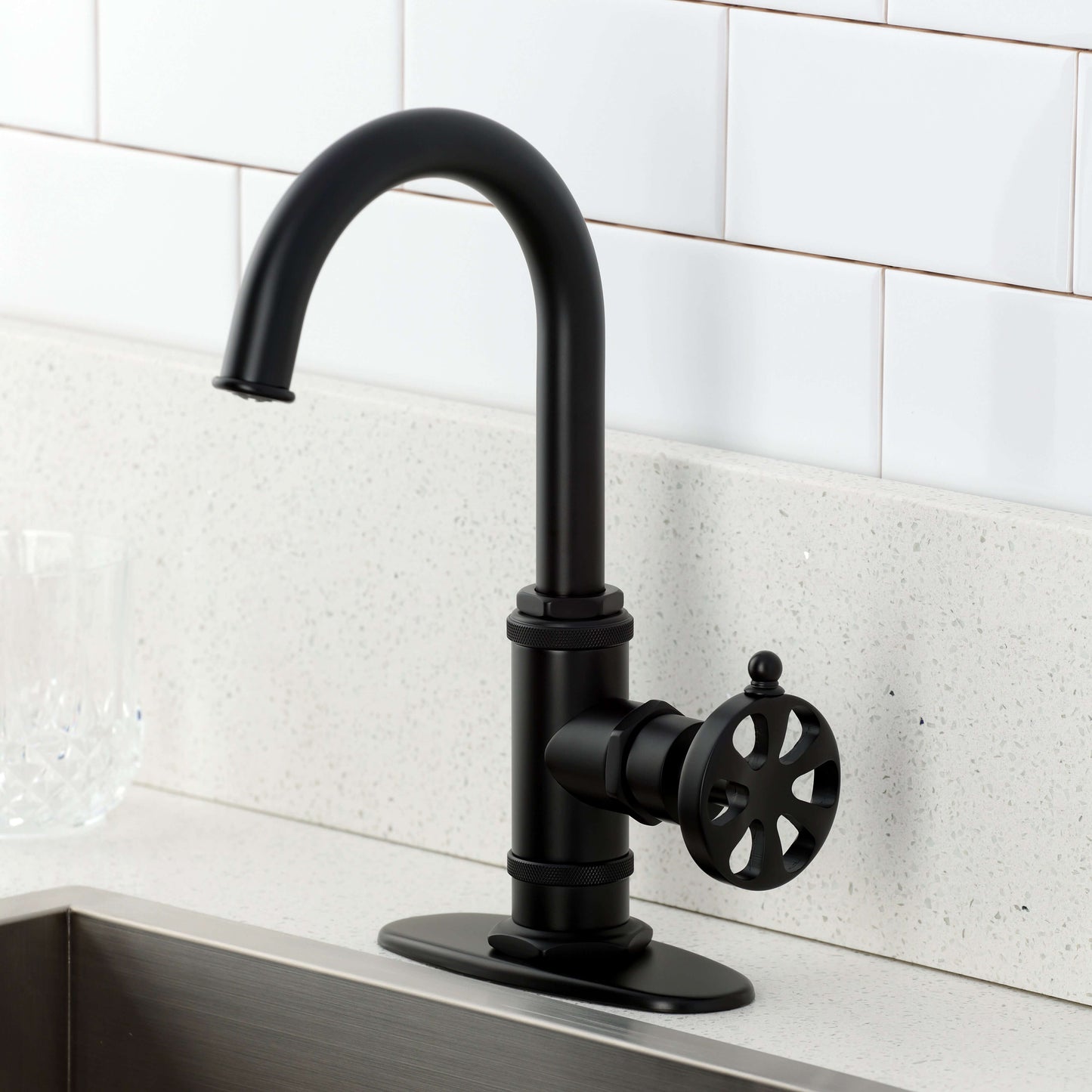 Kingston Brass KSD8503RX Belknap Single-Handle Bar Faucet in matte black finish against a sleek countertop.