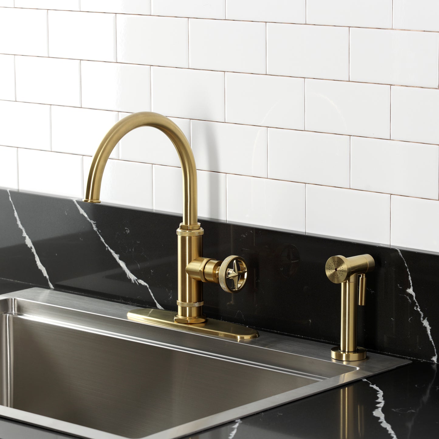 Kingston Brass KSD2433RNX Ostro Single-Handle Kitchen Faucet, Antique Brass with gooseneck spout and side spray.