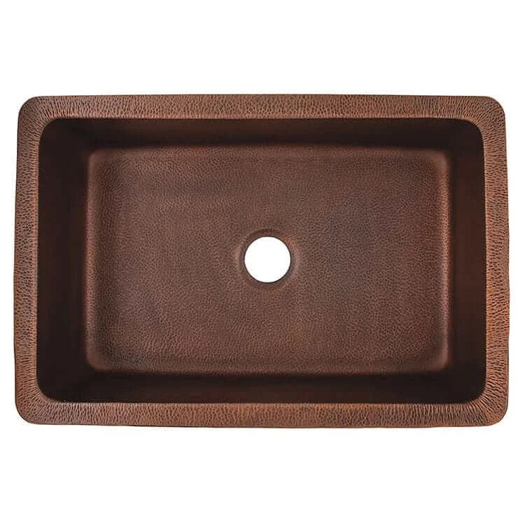 Thompson Quiroga 33" Antique Copper Farmhouse Sink - KSA-3322AH showing top view with hand-hammered finish.
