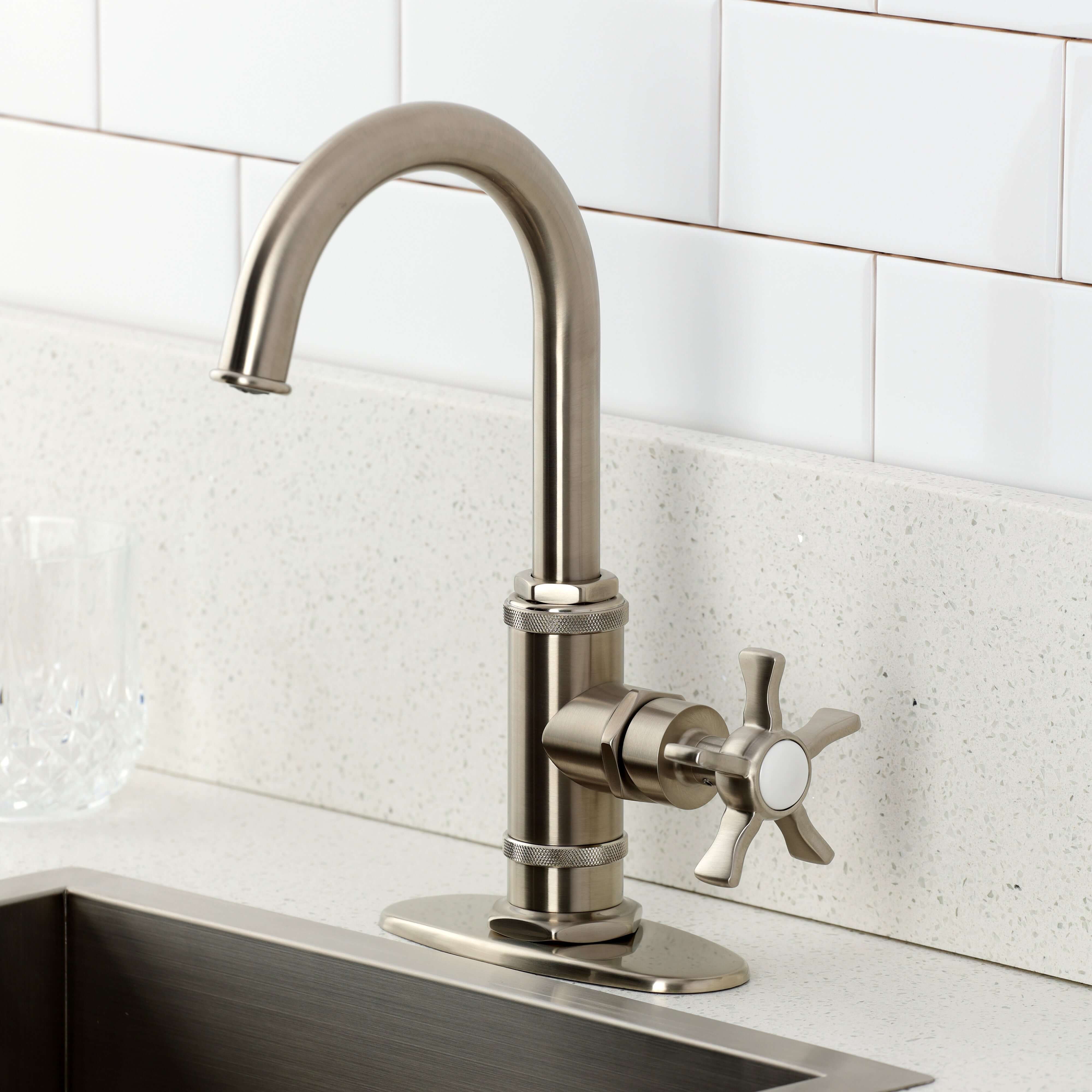 Kingston Brass KSD8503NX Hamilton Single-Handle Bar Faucet, Antique Brass on a countertop