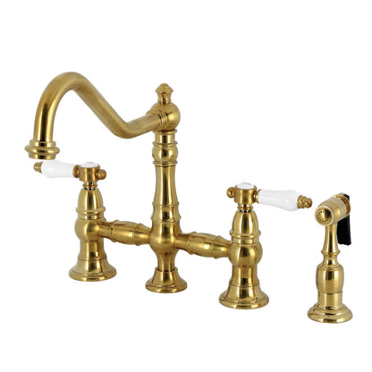 Kingston KS3277BPLBS Bel-Air Bridge Kitchen Faucet with Brass Sprayer, Brushed Brass and porcelain levers image.