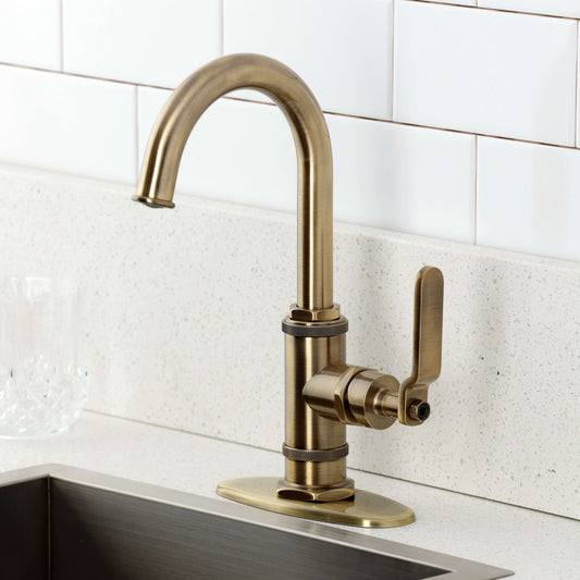 Kingston Brass KSD8503KL Whitaker Single-Handle Bar Faucet, Antique Brass mounted on countertop.