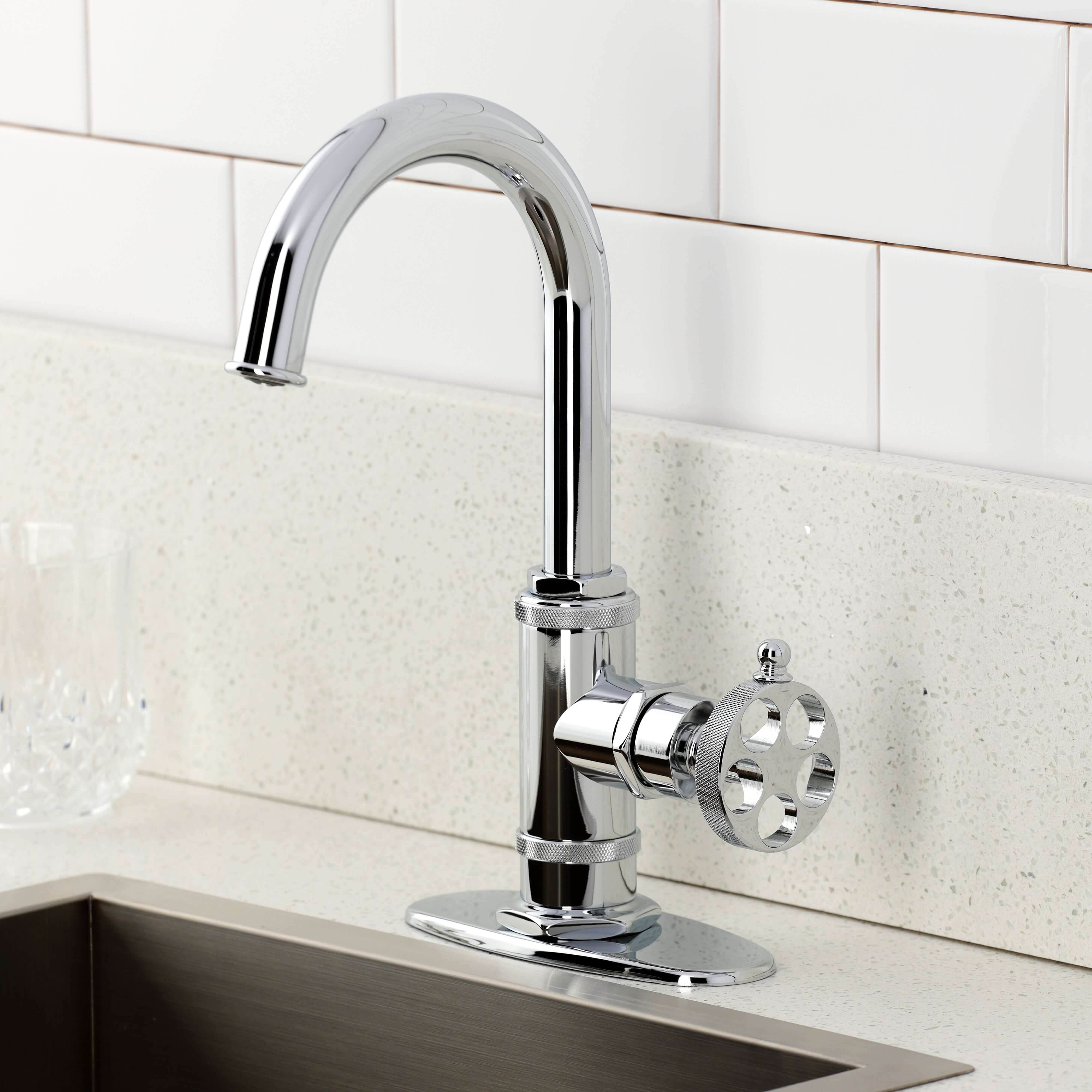 Kingston Brass KSD8503RKZ Wendell Single-Handle Bar Faucet with Knurled Handle, Antique Brass in a modern kitchen setting