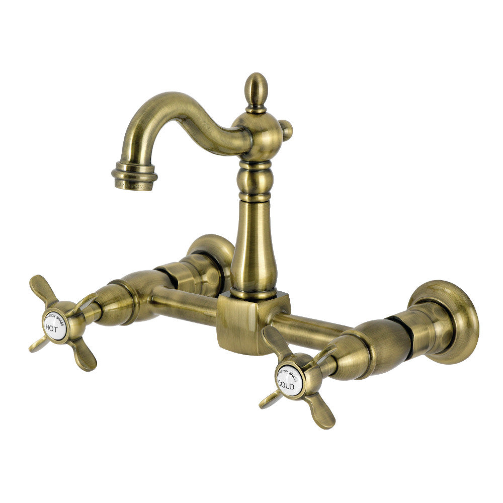 Kingston KS2443BEX Essex Two-Handle Wall Mount Bridge Kitchen Faucet, Antique Brass design, showcasing hot and cold handles.