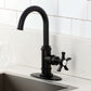 Kingston Brass KSD8503NX Hamilton Single-Handle Bar Faucet, Antique Brass on a modern kitchen countertop.