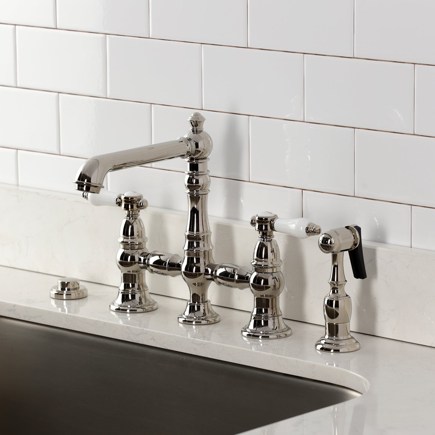 Kingston KS7277BPLBS Bel-Air Bridge Kitchen Faucet with Brass Sprayer, Brushed Brass, elegant design and durable brass construction.