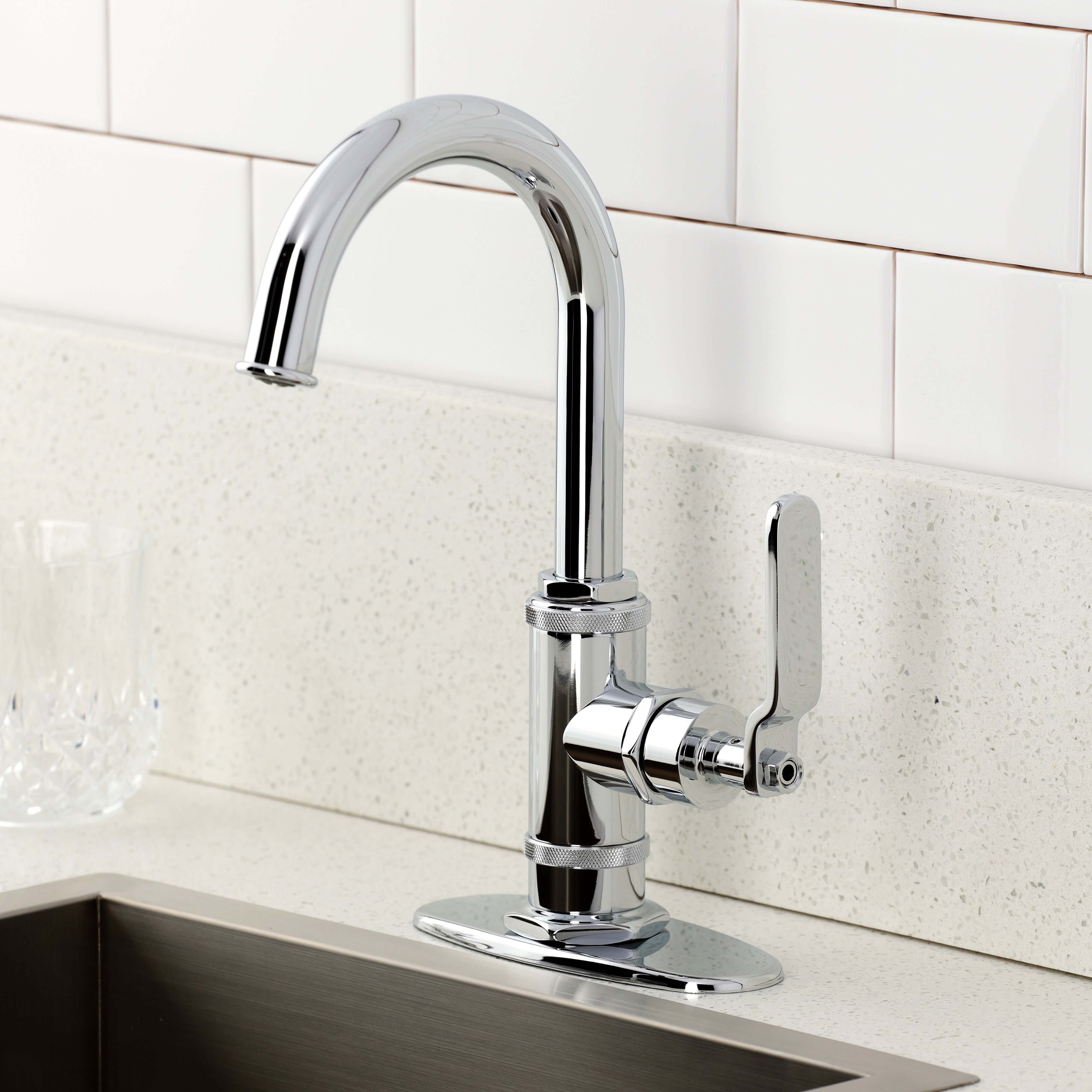 Kingston Brass KSD8503KL Whitaker Single-Handle Bar Faucet, Antique Brass in a modern kitchen setting.