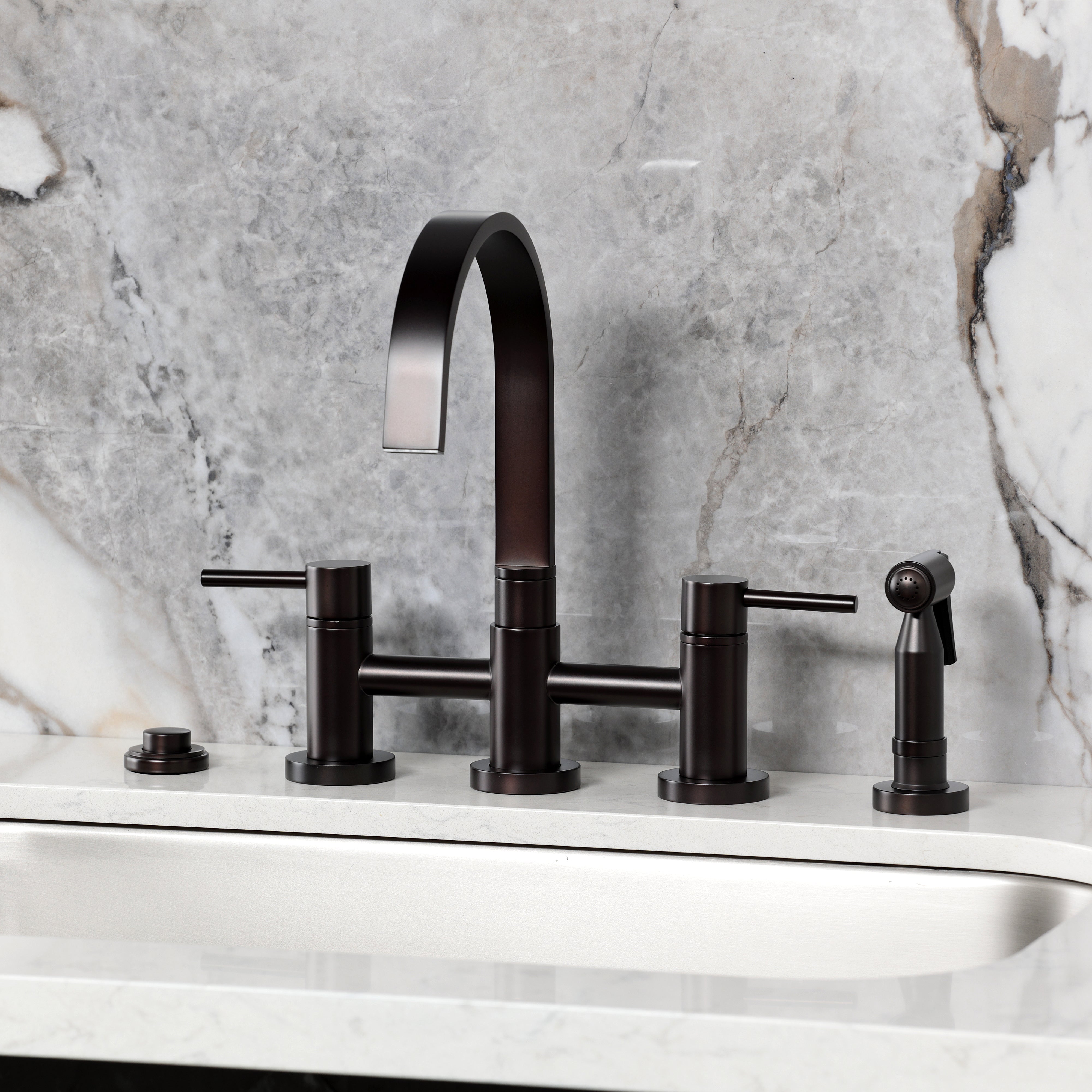 Kingston KS8267DLBS Concord Bridge Kitchen Faucet with Brass Sprayer, Brushed Brass installed in a modern kitchen
