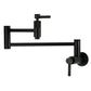 Kingston Brass KS8103KNL Convergent Wall Mount Pot Filler Faucet with Knurled Handle, Antique Brass in Matte Black finish.