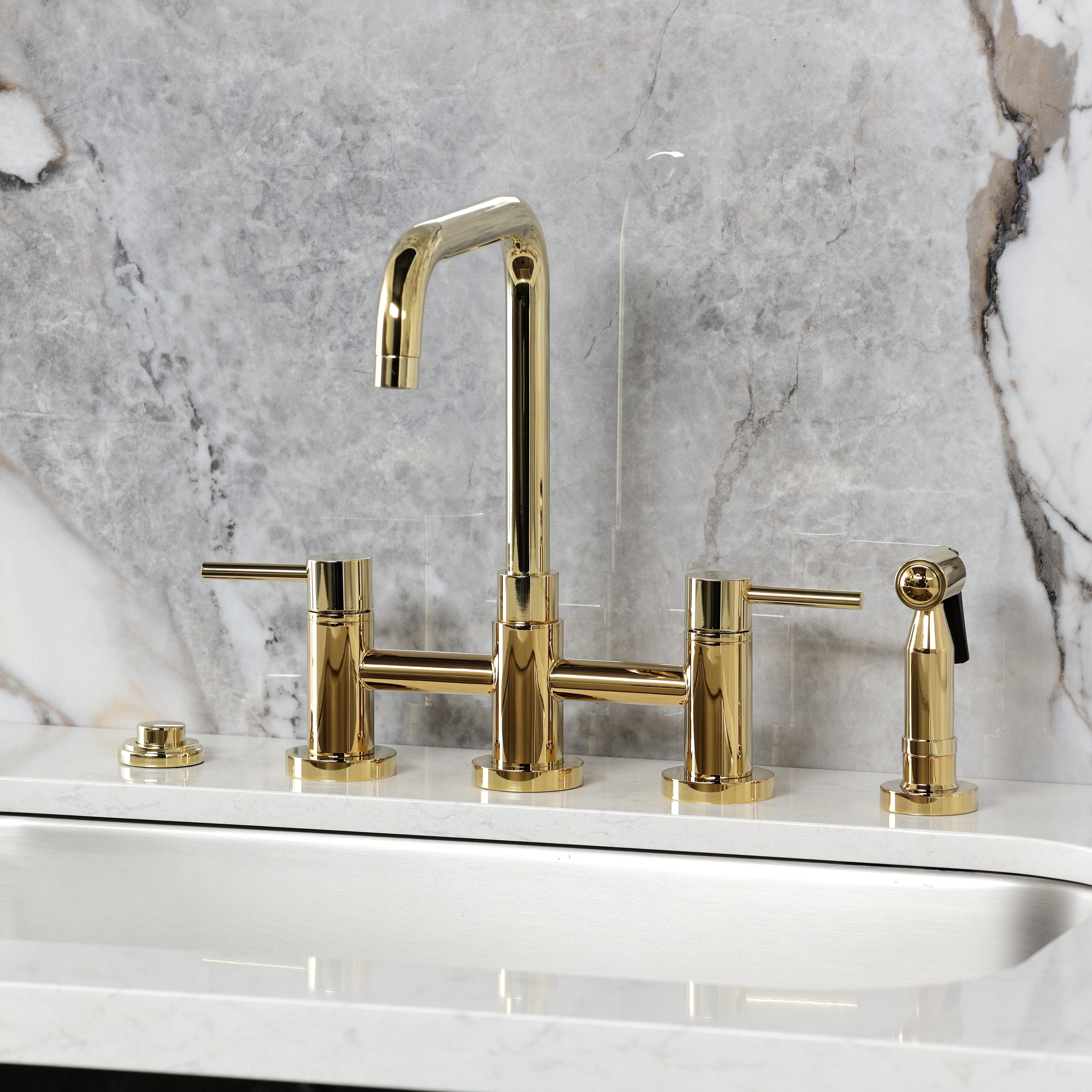 Kingston KS8287DLBS Concord Bridge Kitchen Faucet with Brass Sprayer, Brushed Brass in a modern kitchen setting.