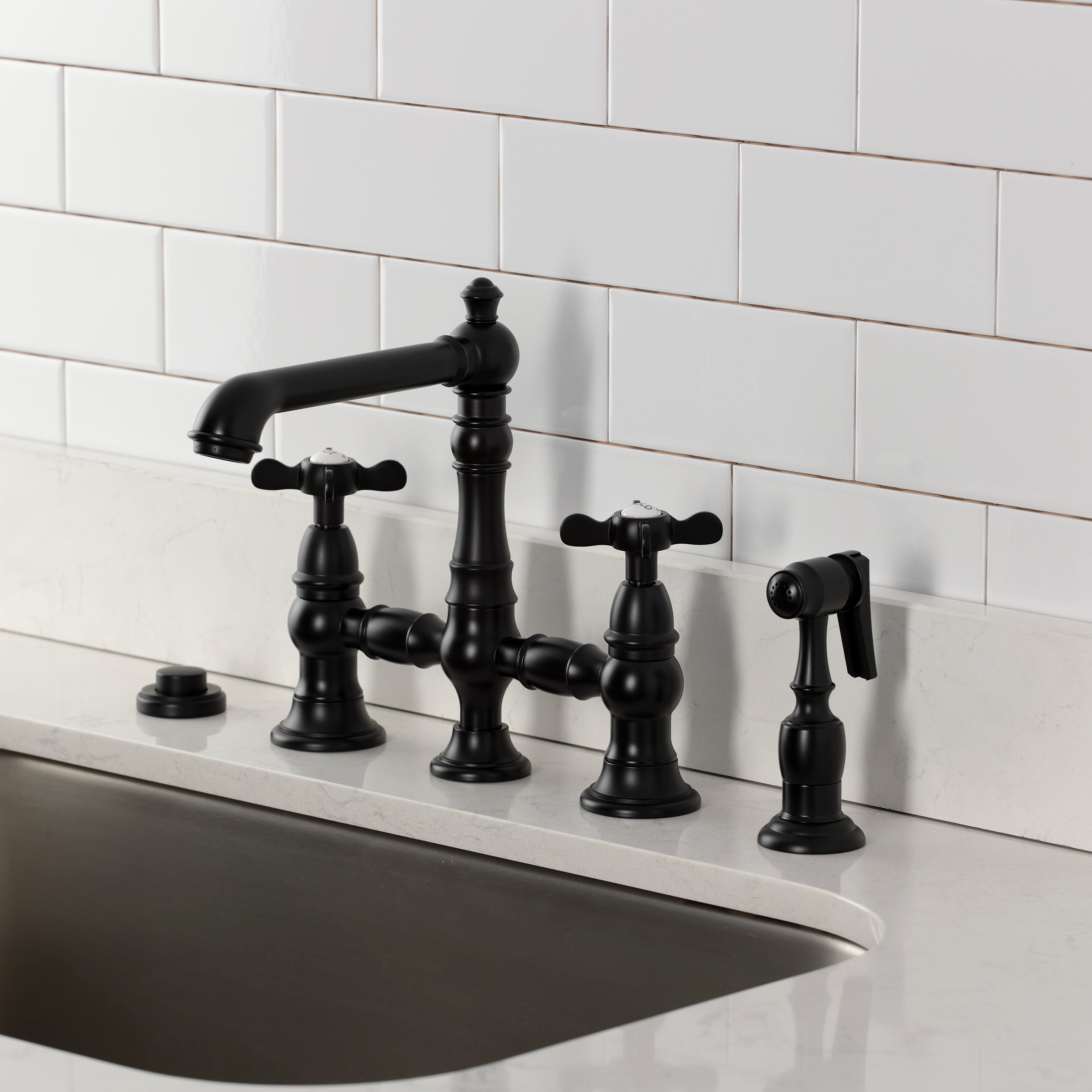 Kingston KS7277BEXBS Essex Bridge Kitchen Faucet with Brass Sprayer, Brushed Brass in a modern kitchen setting