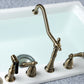 Kingston Brass "Antique Brass" widespread kitchen faucet set on a white sink with a gray background