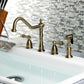 Kingston Brass "Antique Brass" widespread kitchen faucet set on a white sink with a decorative tile backsplash.