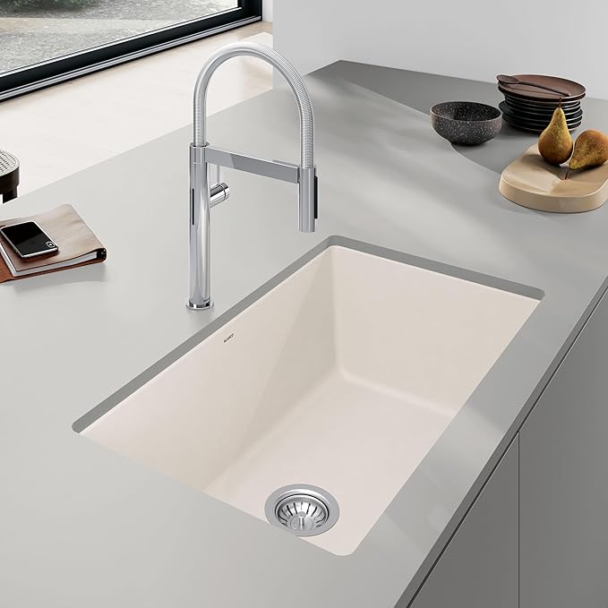 Blanco Silgranit Super Single 32"  kitchen sink in Soft White with a chrome faucet in a clean, minimalistic setting.