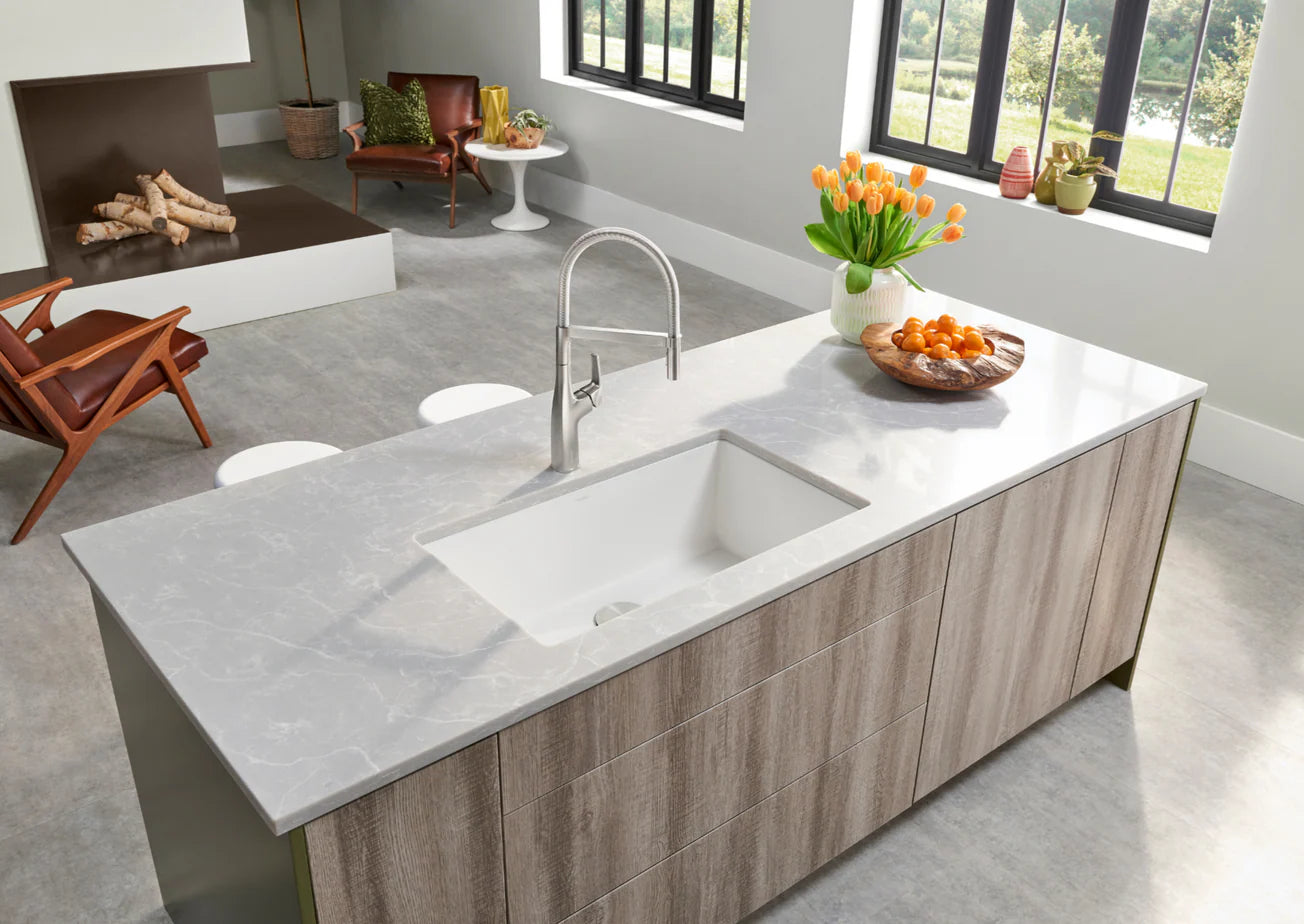 Modern kitchen with a White Blanco Precis 32" Silgranit kitchen sink installed in a kitchen island