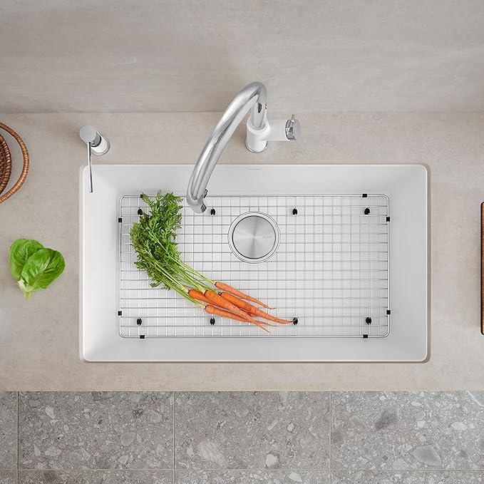 White Blanco Precis 32" Silgranit kitchen sink with grid and vegetables on a neutral countertop