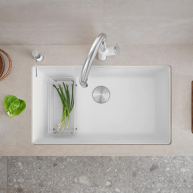 Modern white Blanco Precis 32" Silgranit kitchen sink with silver faucet and vegetables on a light gray countertop.