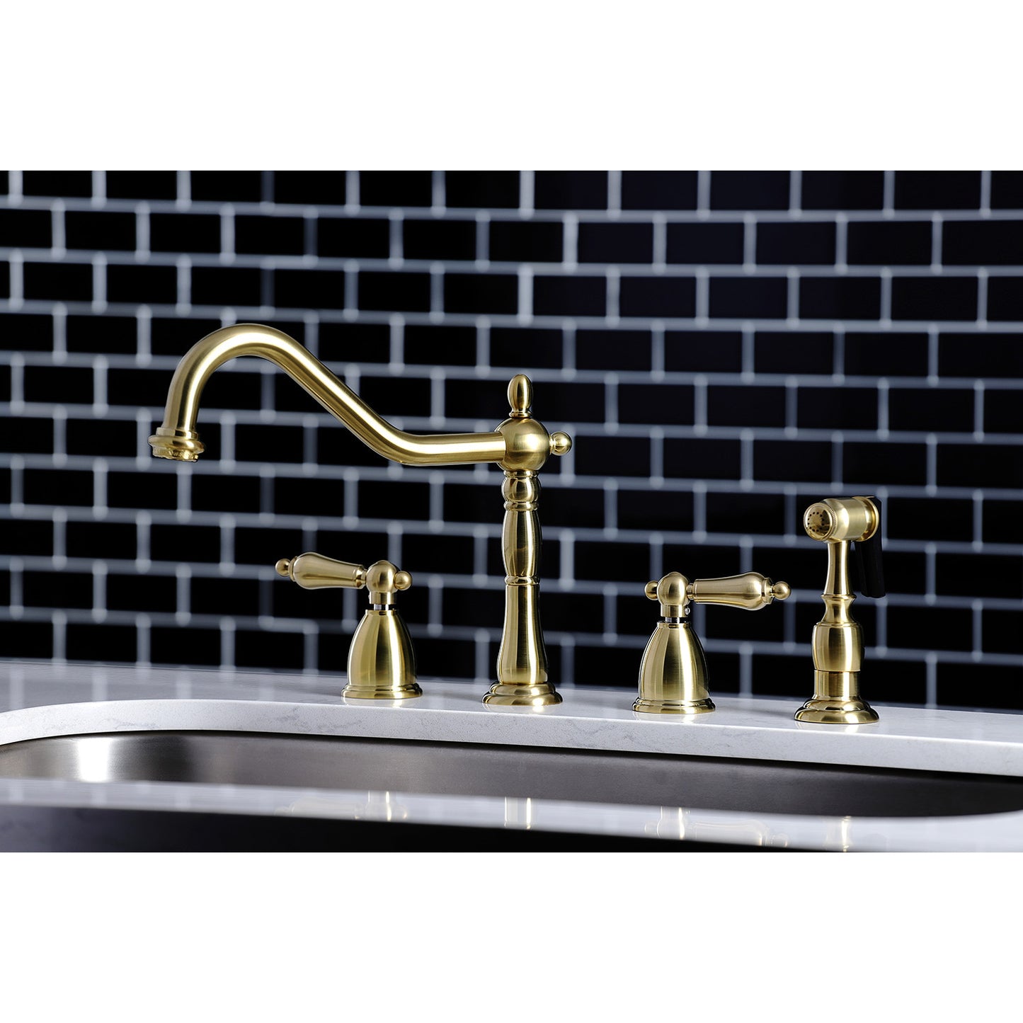 Kingston Brass "Brushed Brass" widespread kitchen faucet set on a sink with a black tiled wall background