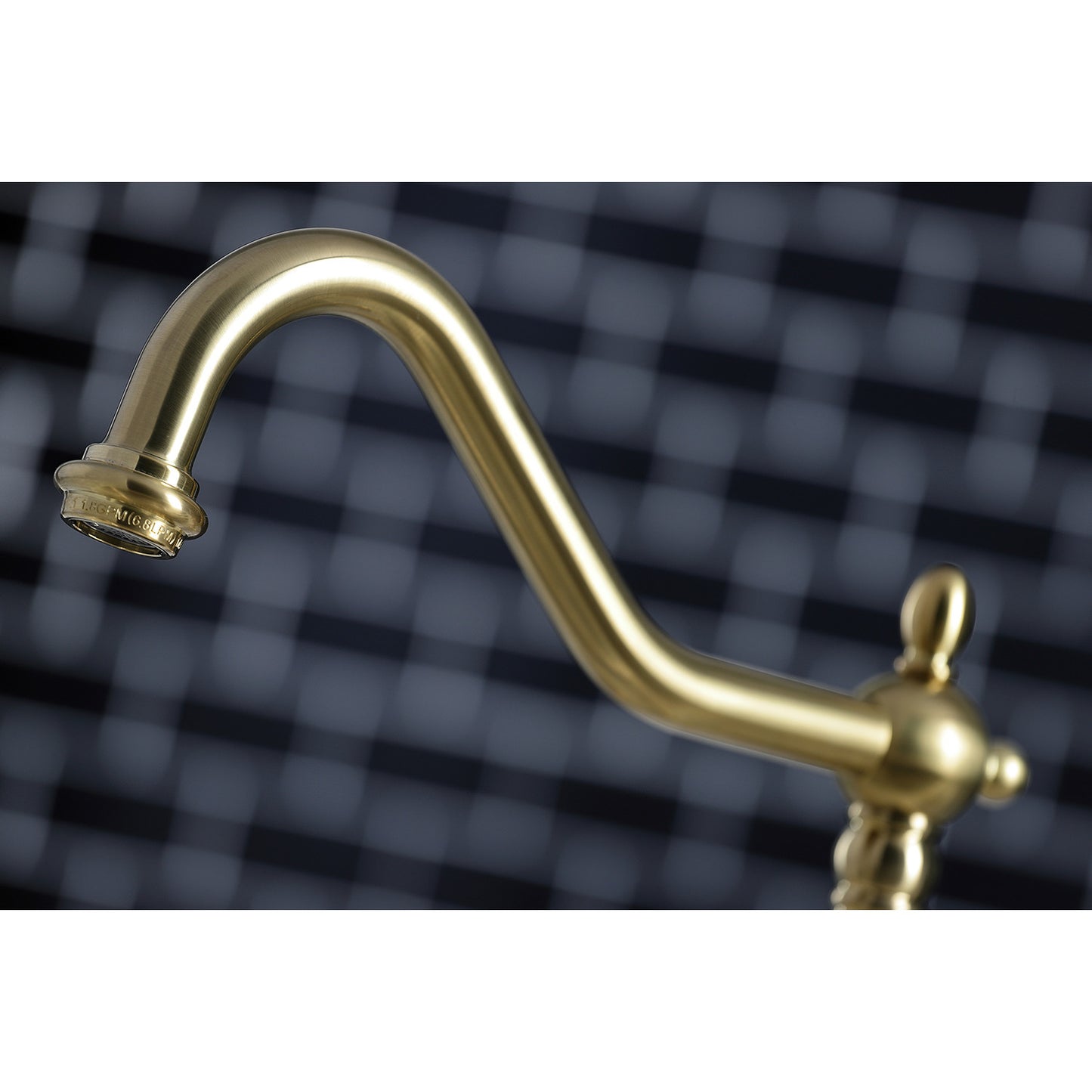 Kingston Brass "Brushed Brass" widespread kitchen faucet  against a checkered background