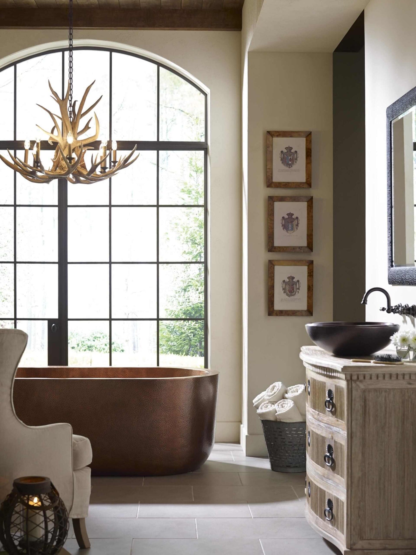 Thompson Cuitzeo Handcrafted Double Wall Antique Copper 14 Gauge bathtub in a luxurious bathroom setting.
