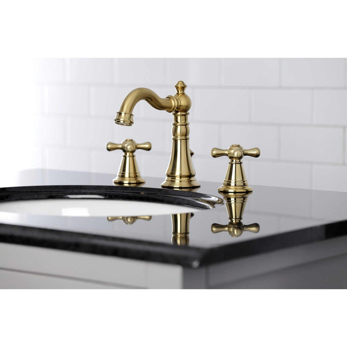 KINGSTON Brass Widespread Bathroom Faucet with Pop-Up Drain - FSC1979AAX right side view showcasing the elegant faucet design.