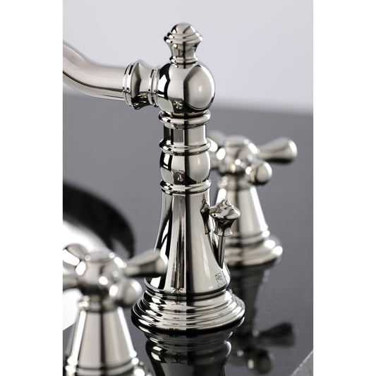Close-up view of KINGSTON Brass Widespread Bathroom Faucet with Pop-Up Drain - FSC1979AAX showcasing Victorian details.