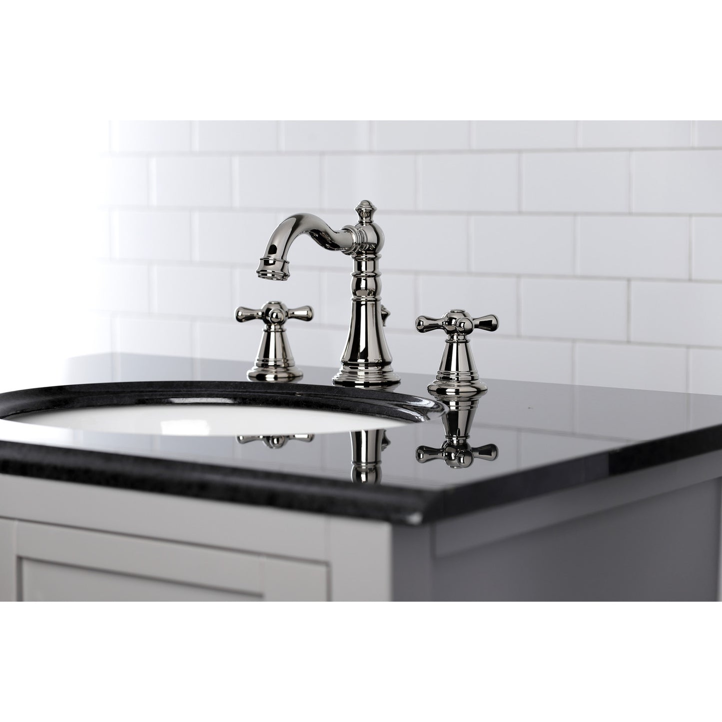 KINGSTON Brass Widespread Bathroom Faucet with Pop-Up Drain - FSC1979AAX right side view with marble countertop
