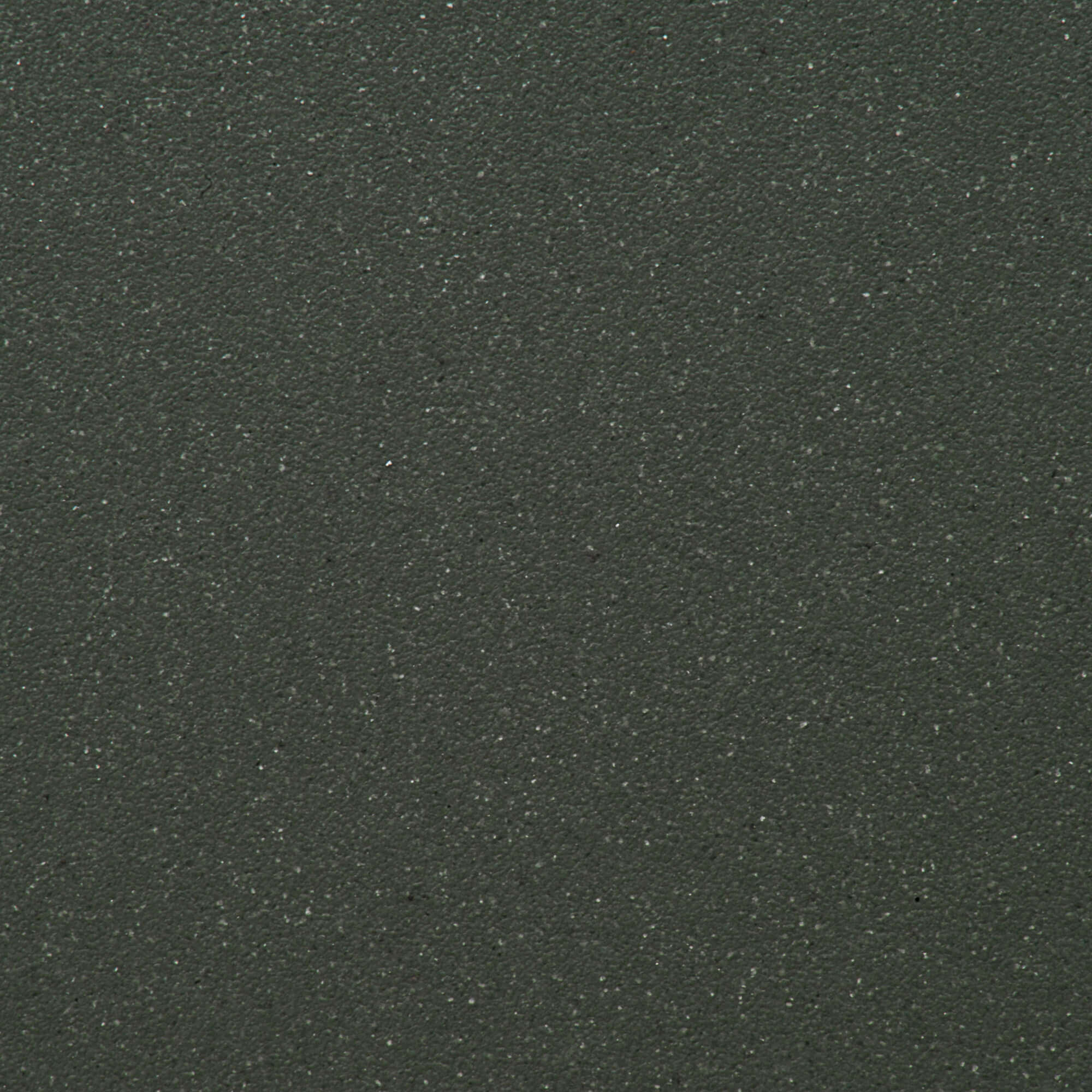 Close-up of Juniper Green granite texture with a smooth finish and subtle glittery flecks.