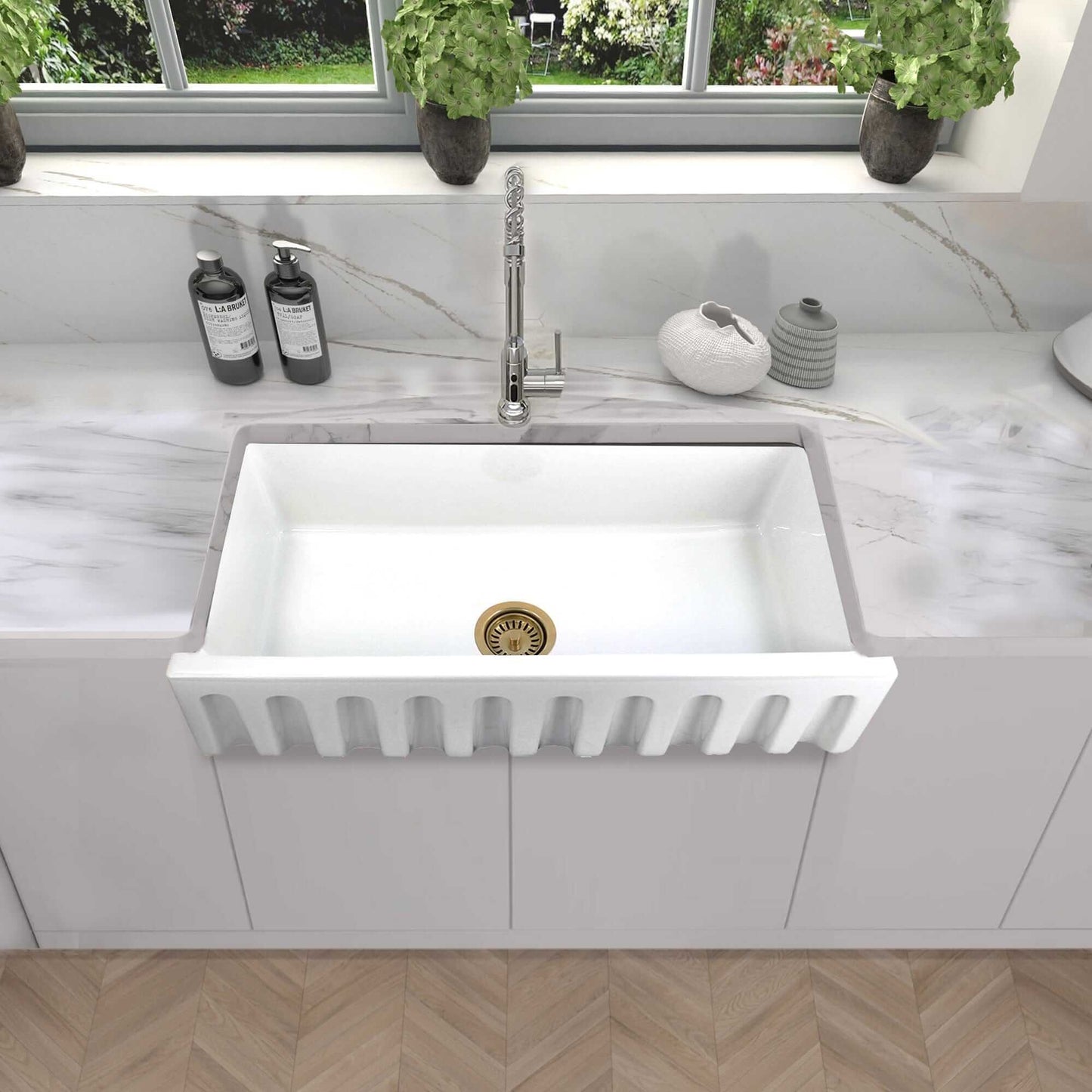Nantucket 36" Reversible Italian Fireclay Farmhouse Sink - ISFCW36x18SO in a modern kitchen setting with elegant decor.