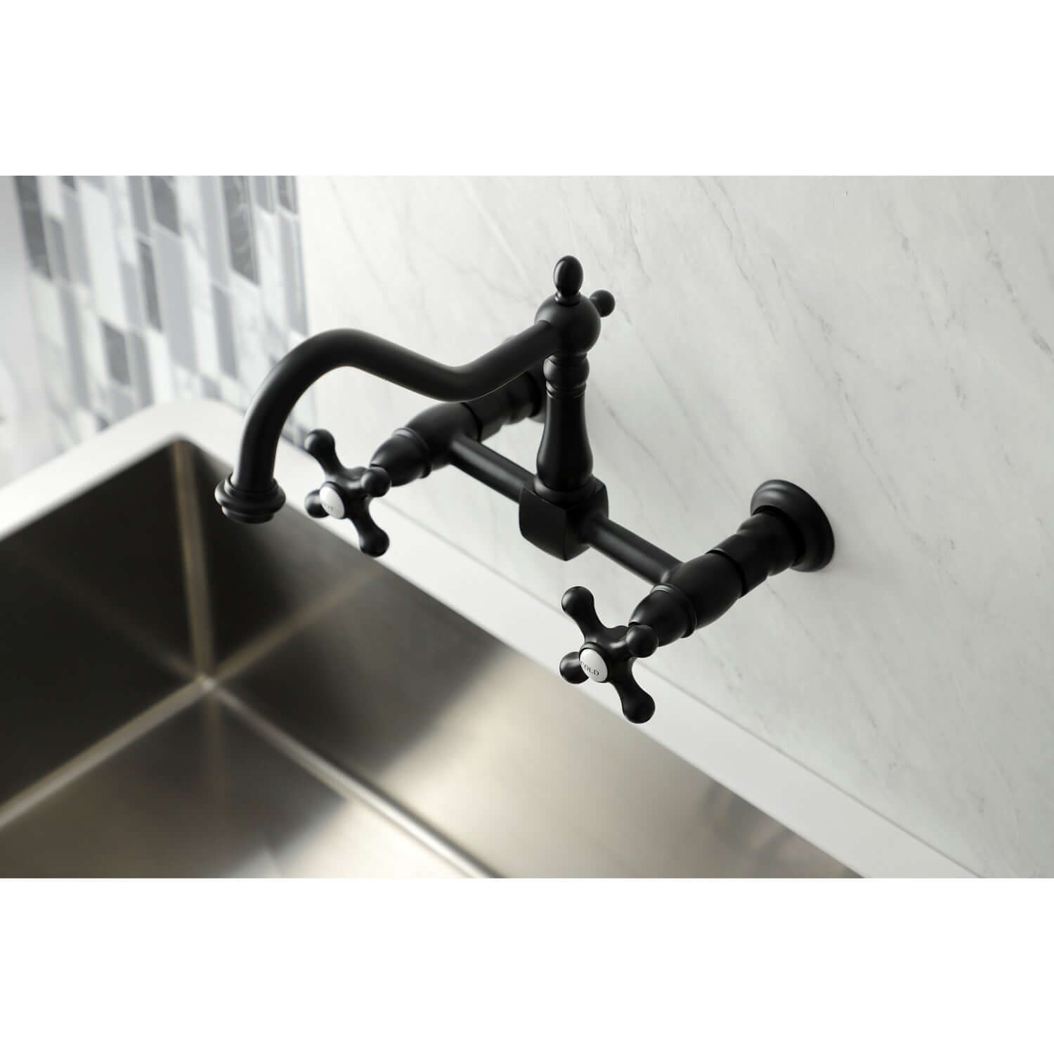 Kingston Brass matte black double-handle 2-hole wall-mount bridge kitchen faucet mounted on a tiled wall above a sink.