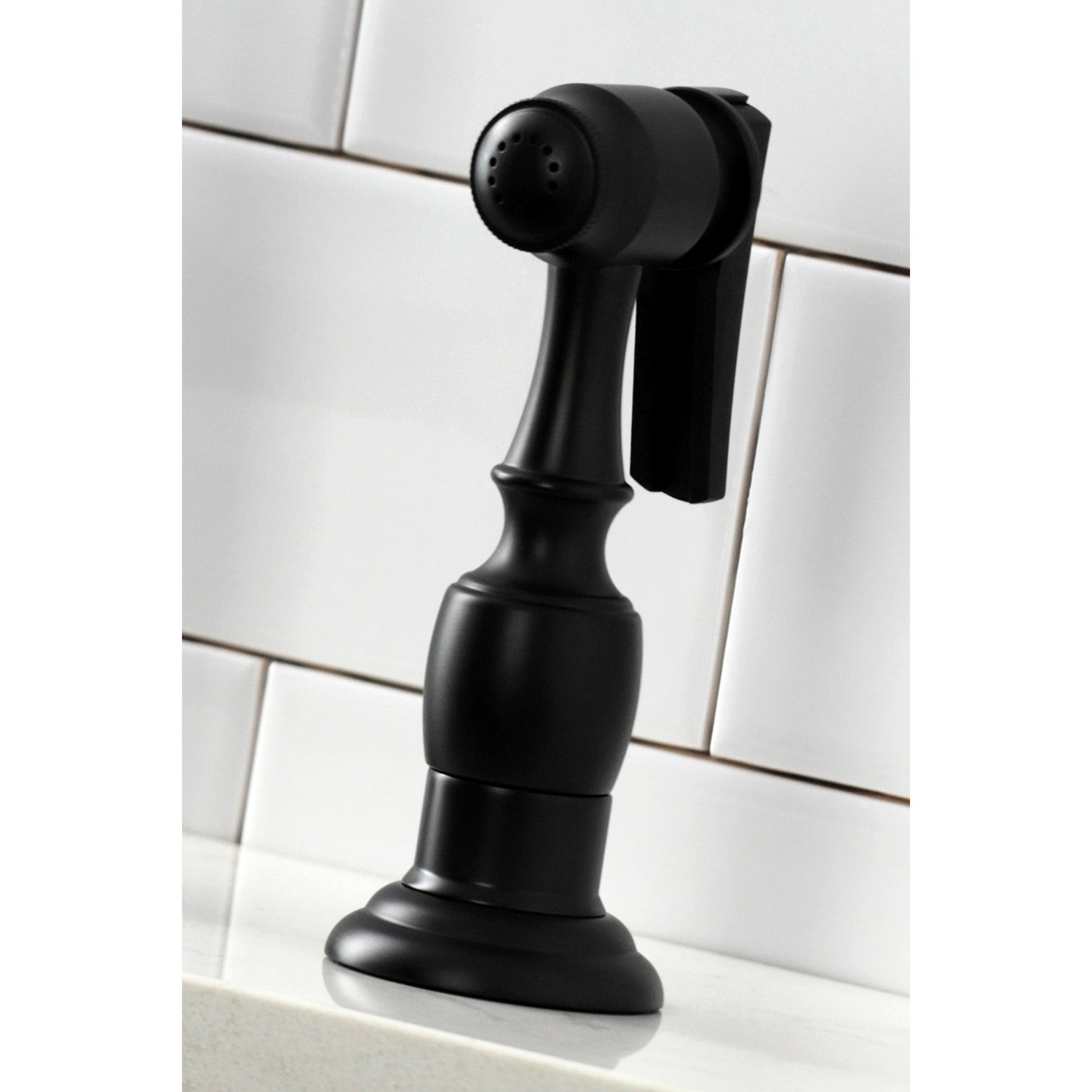 Close up of side spray for Kingston Brass KS1270ALBS matte black bridge faucet