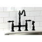 Kingston Brass KS1270ALBS matte black vintage-style bridge faucet set against a white tiled wall.