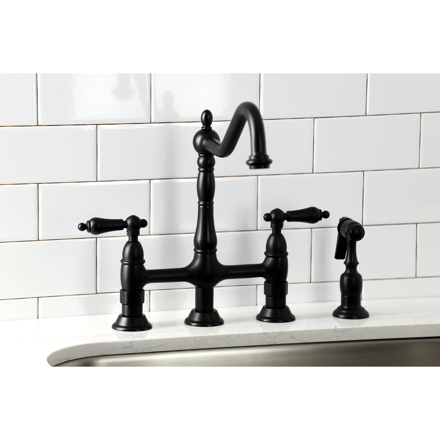 KINGSTON Brass Heritage Bridge Kitchen Faucet with Brass Sprayer in black finish, side view against white tile wall.