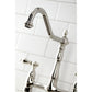 Close up of Kingston Brass KS1276ALBS polished nickel kitchen faucet spout on a white tiled wall