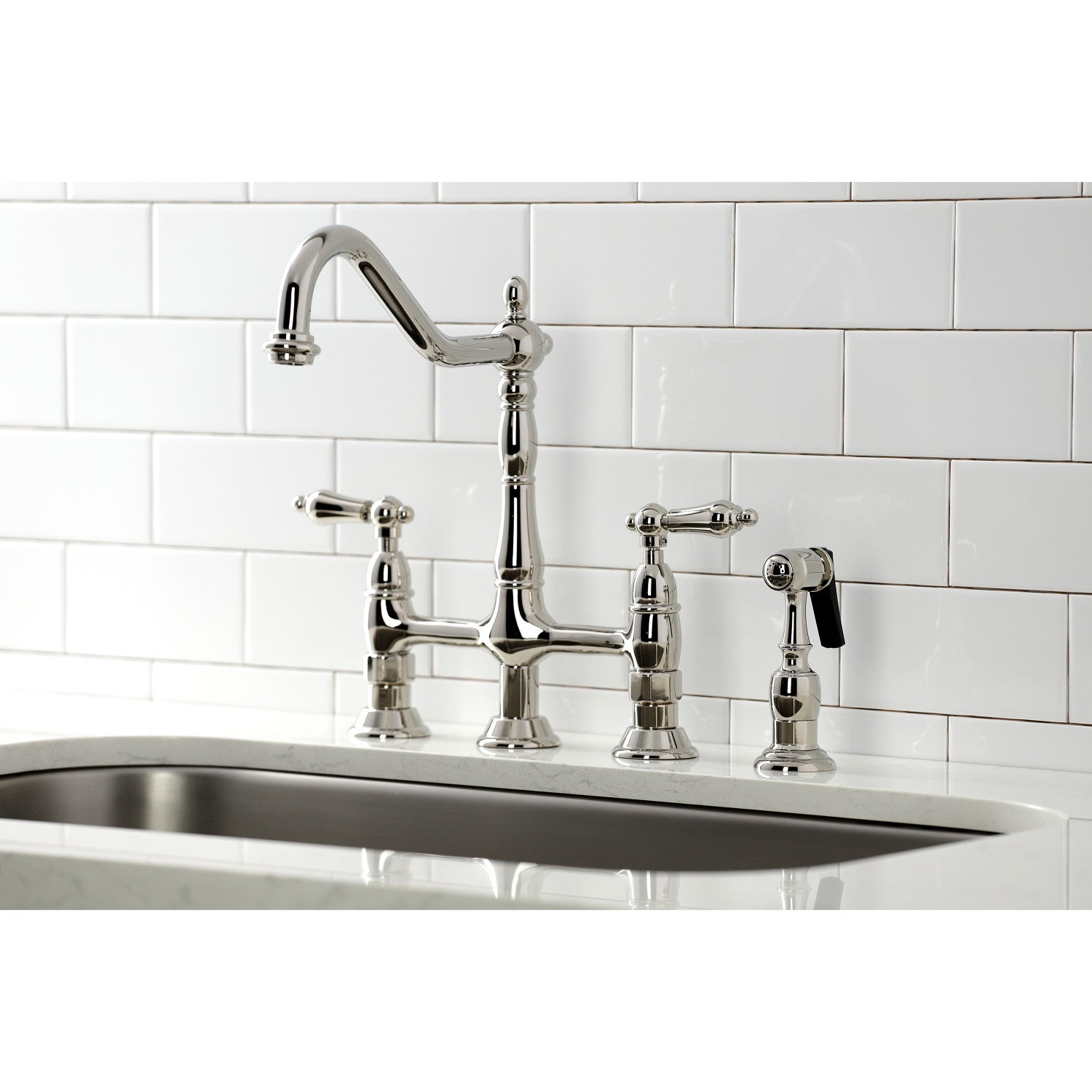 Kingston Brass KS1276ALBS polished nickel kitchen faucet and sink against a white tiled wall