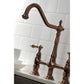 Close up of faucet head for Kingston Brass KS127ALBSAC antique copper kitchen faucet on a white tiled wall