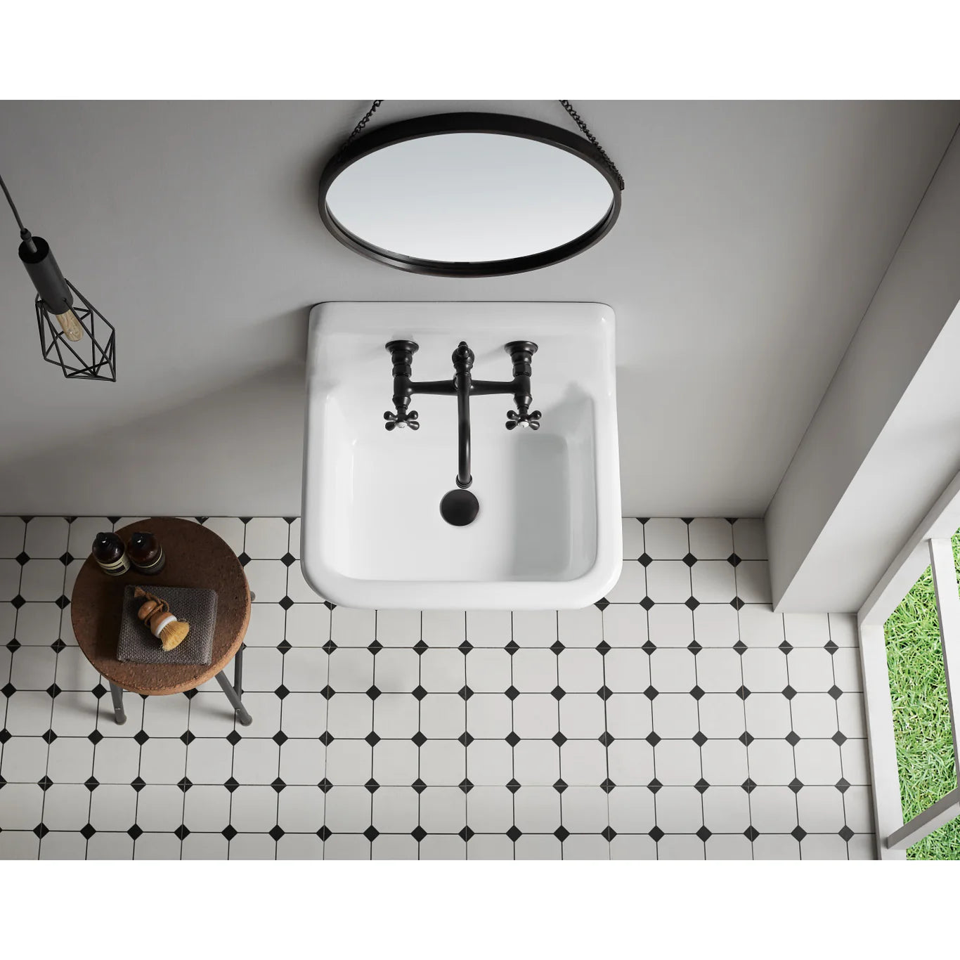 Overhead view of the KINGSTON Brass Vintage Wall Mount Bathroom Faucet - KS3245AX installed above a sleek white sink.
