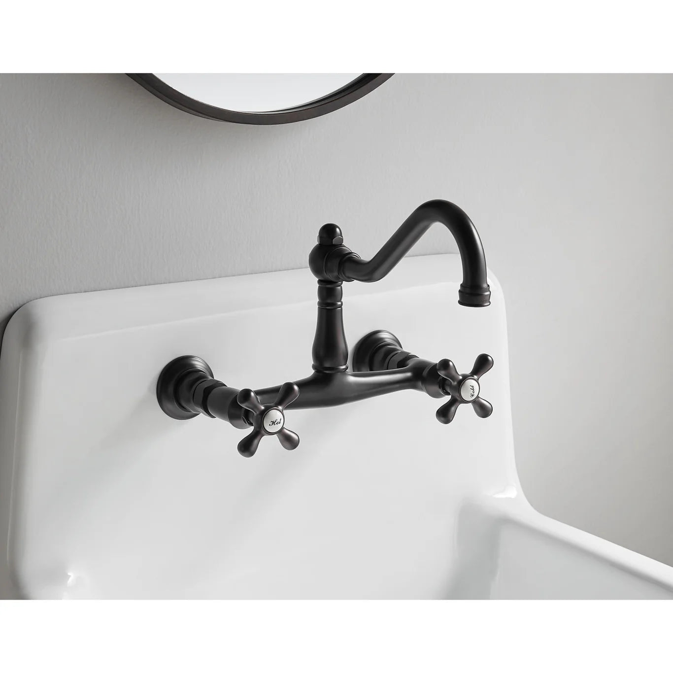 KINGSTON Brass Vintage Wall Mount Bathroom Faucet - KS3245AX left side view with cross handles over sink