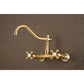 Kingston Brass KS3237AX brushed brass wall-mounted faucet on a brown textured background