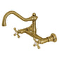 Kingston Brass KS3237AX brushed brass wall mounted bathroom faucet on a white background