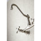 Kingston Brass KS3248AX brushed nickel  bathroom faucet mounted on a textured white background