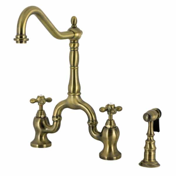 Kingston Brass English Country Deck Mount Bridge Kitchen Faucet featuring an elegant design with dual lever handles and sprayer.