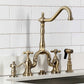 Kingston Brass KS7753AXBS Antique Brass kitchen faucet set against a white tiled wall
