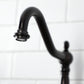 Detail of Kingston Brass KS7755AXBS oil rubbed bronze kitchen bridge faucet against a white tiled wall