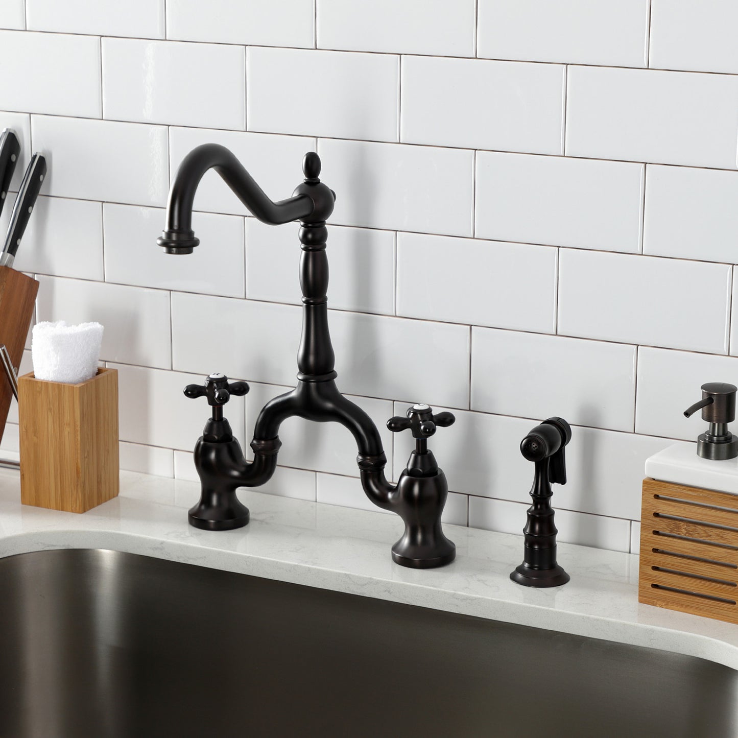 Kingston Brass English Country Deck Mount Bridge Kitchen Faucet left side view showcasing traditional design and elegance.