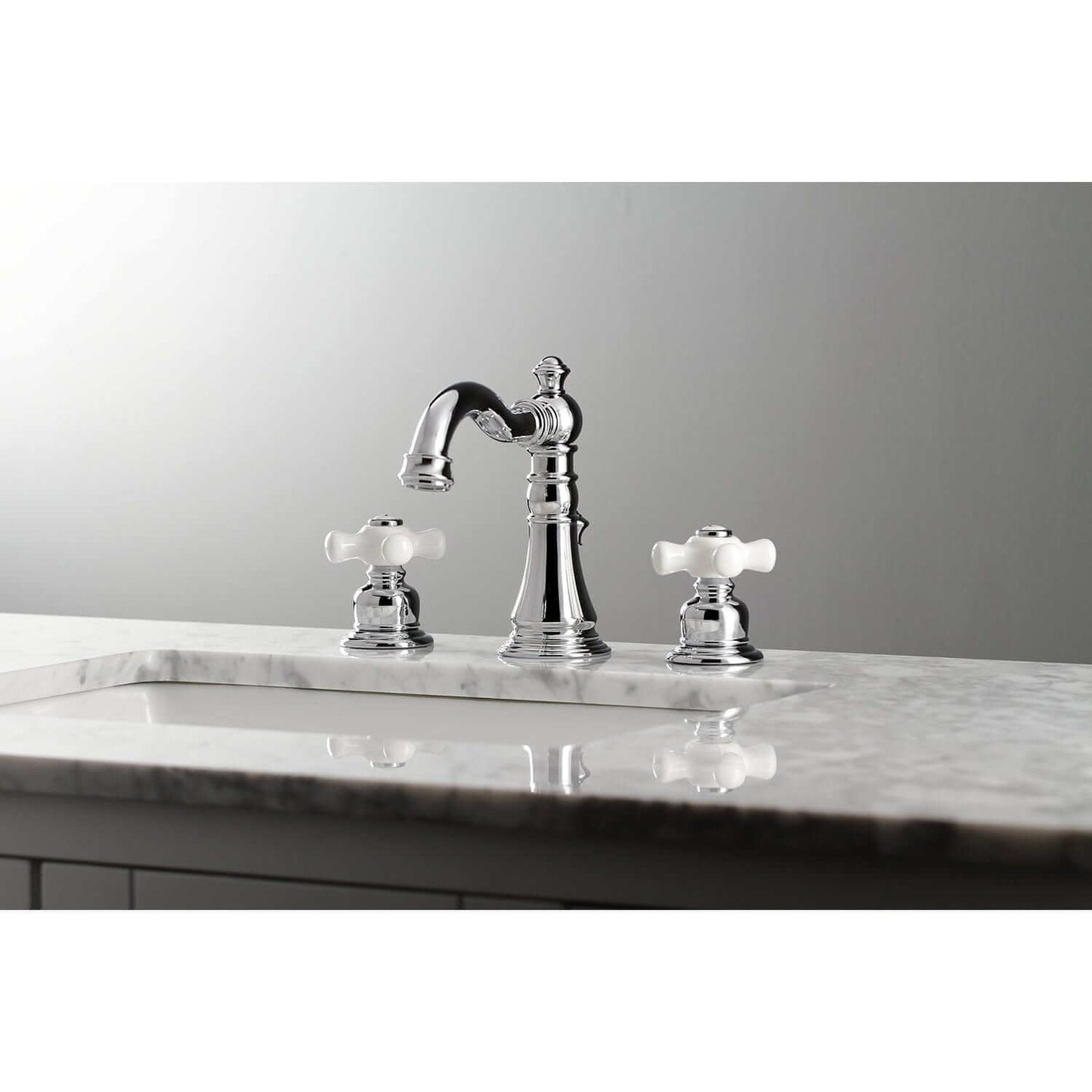 Close-up view of KINGSTON Brass American Classic Widespread Bathroom Faucet showcasing Victorian design with elegant handles.