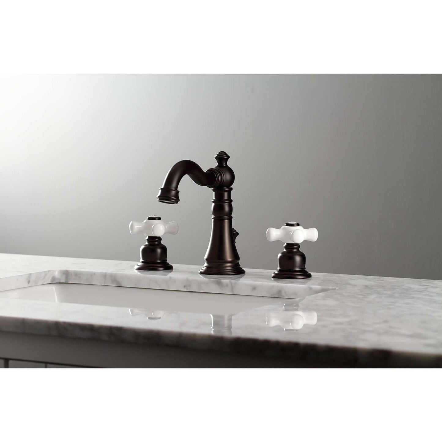 KINGSTON Brass American Classic Widespread Bathroom Faucet in a left side view showcasing elegant design with white handles.