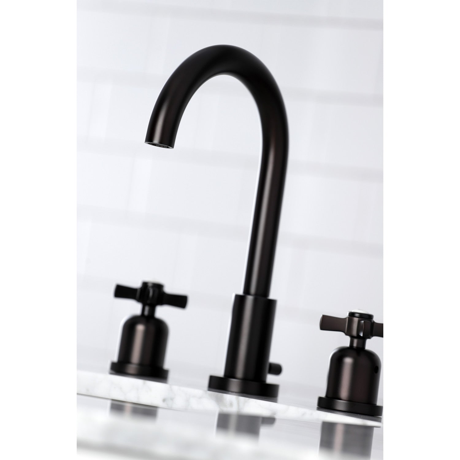 Close up Lifestyle image of Millennium widespread faucet in neutral bathroom in oil rubbed bronze finish